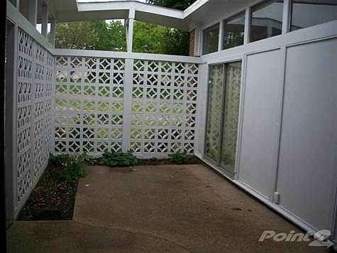 Enclosed front patio area