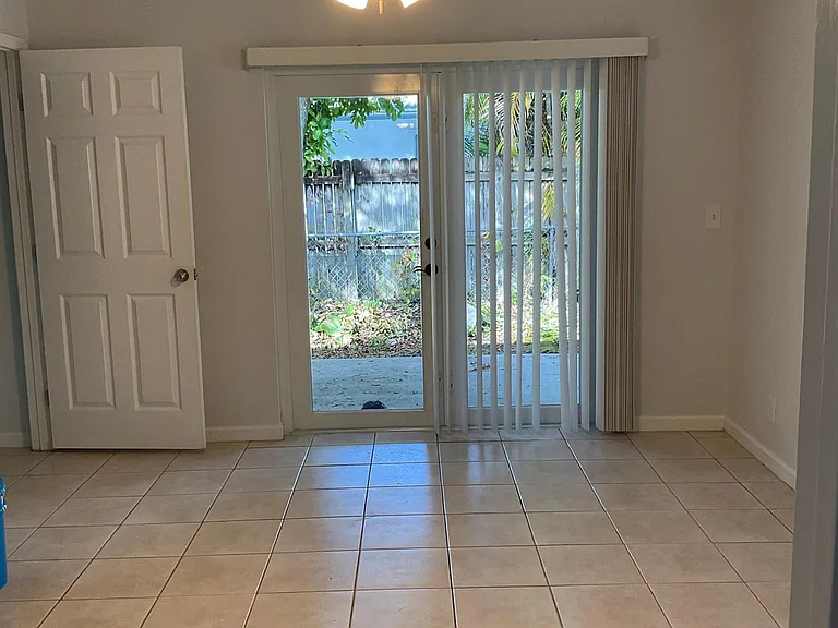 Primary bedroom, French doors to patio