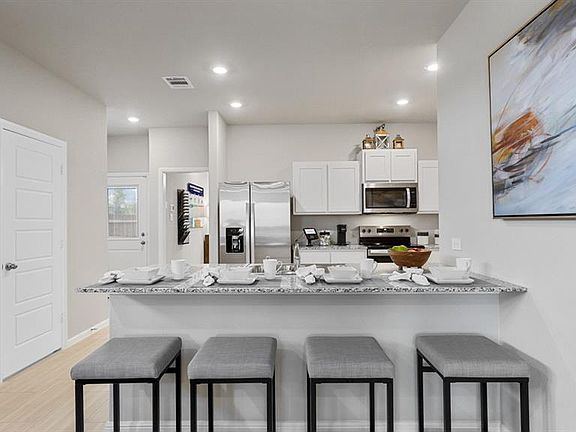 Kitchen - All Home and community information, including pricing, included features, terms, availability and amenities, are subject to change at any time without notice or obligation. All Drawings, pictures, photographs, video, square footages, floor plans, elevations, features, colors and sizes are approximate for illustration purposes only and will vary from the homes as built.