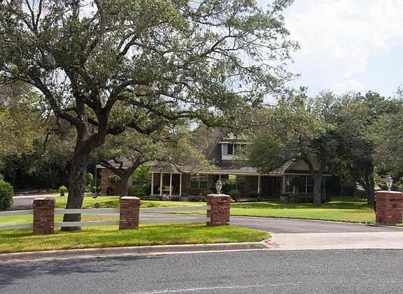 Brick columns shape the front entrance