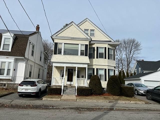 Front of house with front porch entry. Includes 2 on street parking spots.