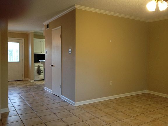 Front den into kitchen looking from front door