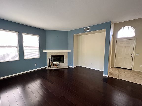 Gas fireplace and media alcove in great room