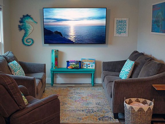 living room, couch, love seat, recliner/lift chair and 65" Roku smart TV