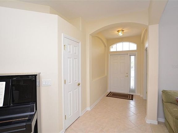 Enter to this lovely move-in ready home with plenty of natural light throughout and lake views behind.