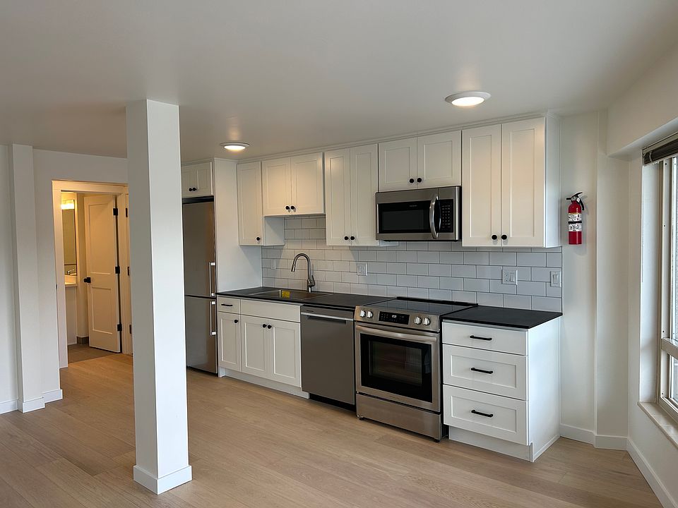 Modern Kitchen with ample cabinets for storage