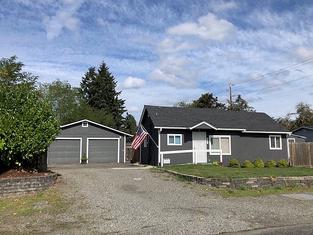 Front Entrance. Off-street parking included in rent. (Garage parking and/or storage plus $25/month.)