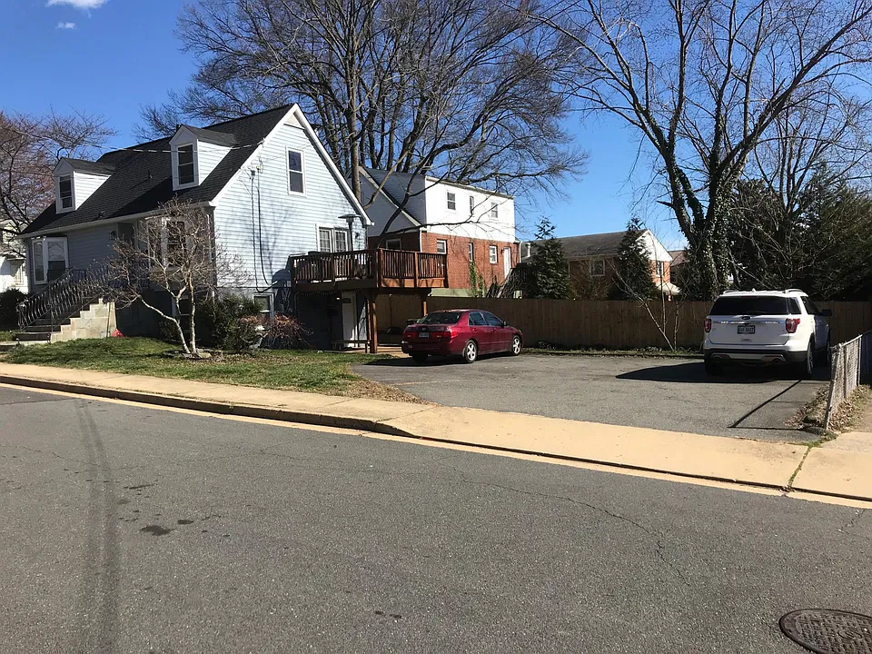Front of house and parking lot
