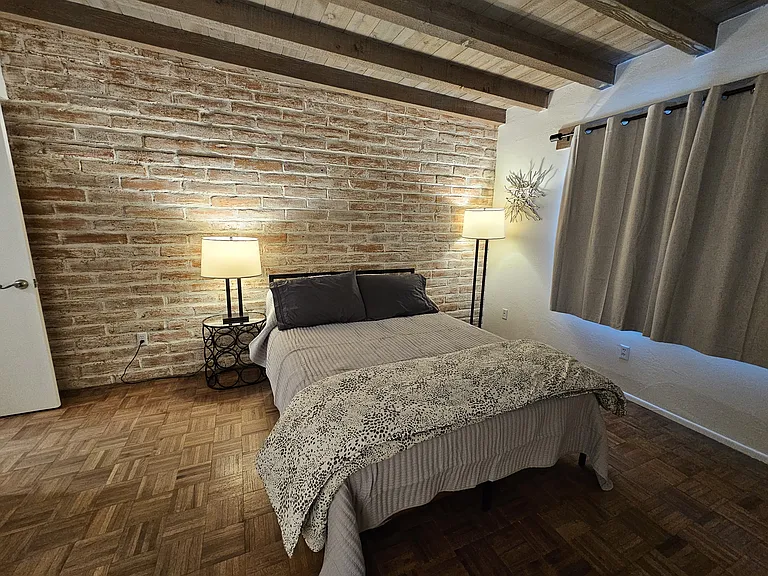 Second bedroom has queen bed.