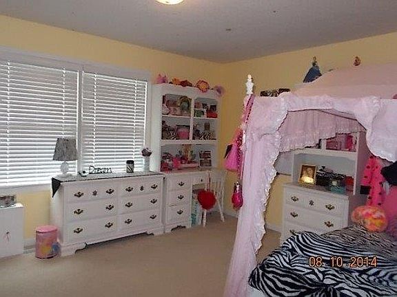 Bedroom 2-Upstairs
						:
						Large 2nd bdrm w/two beautiful windows. View the pond and fountain.