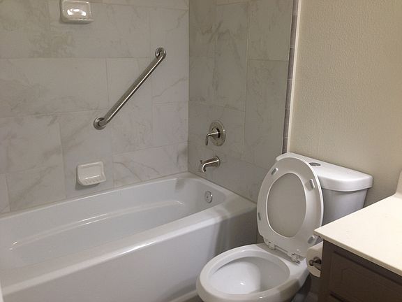 New tile, tub and toilet