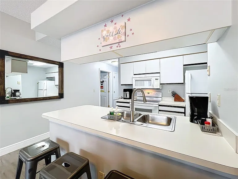 2731 N Poinciana Blvd #114 — Photo 38