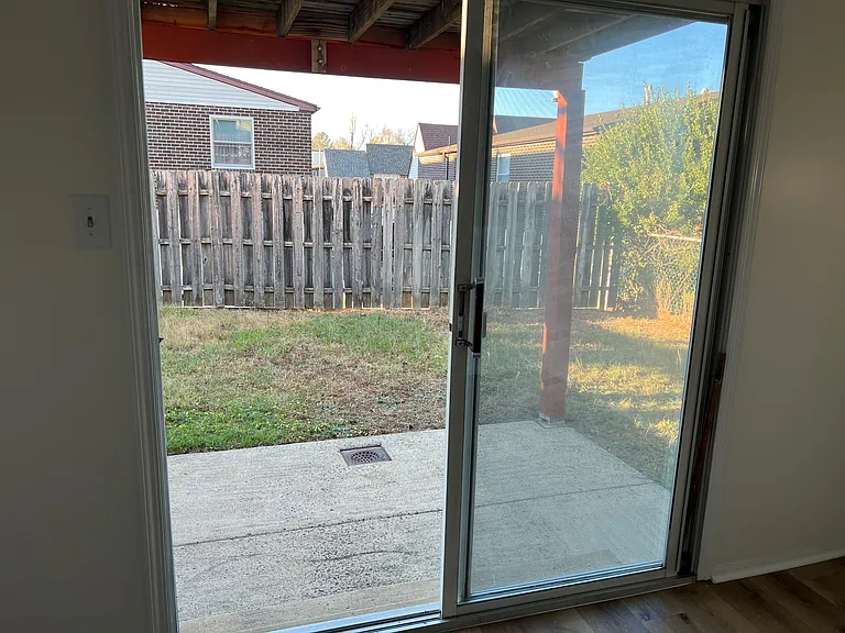 1st Bedroom - sliding door to private patio & backyard