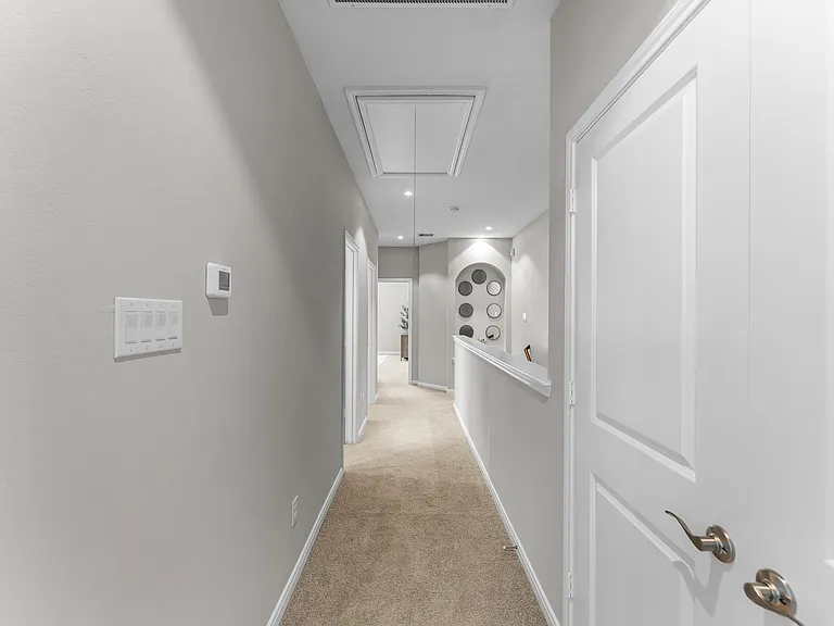 Phase II | Second Floor Hallway with Guest Bathroom and Washer/Dryer Room (Plan 4201)