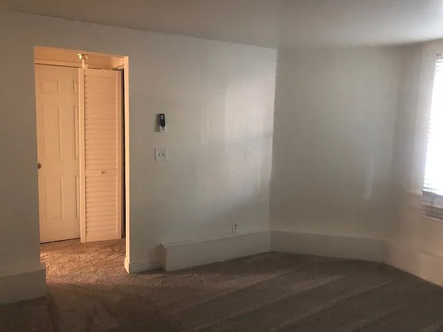 Front bedroom, doorway to master closets