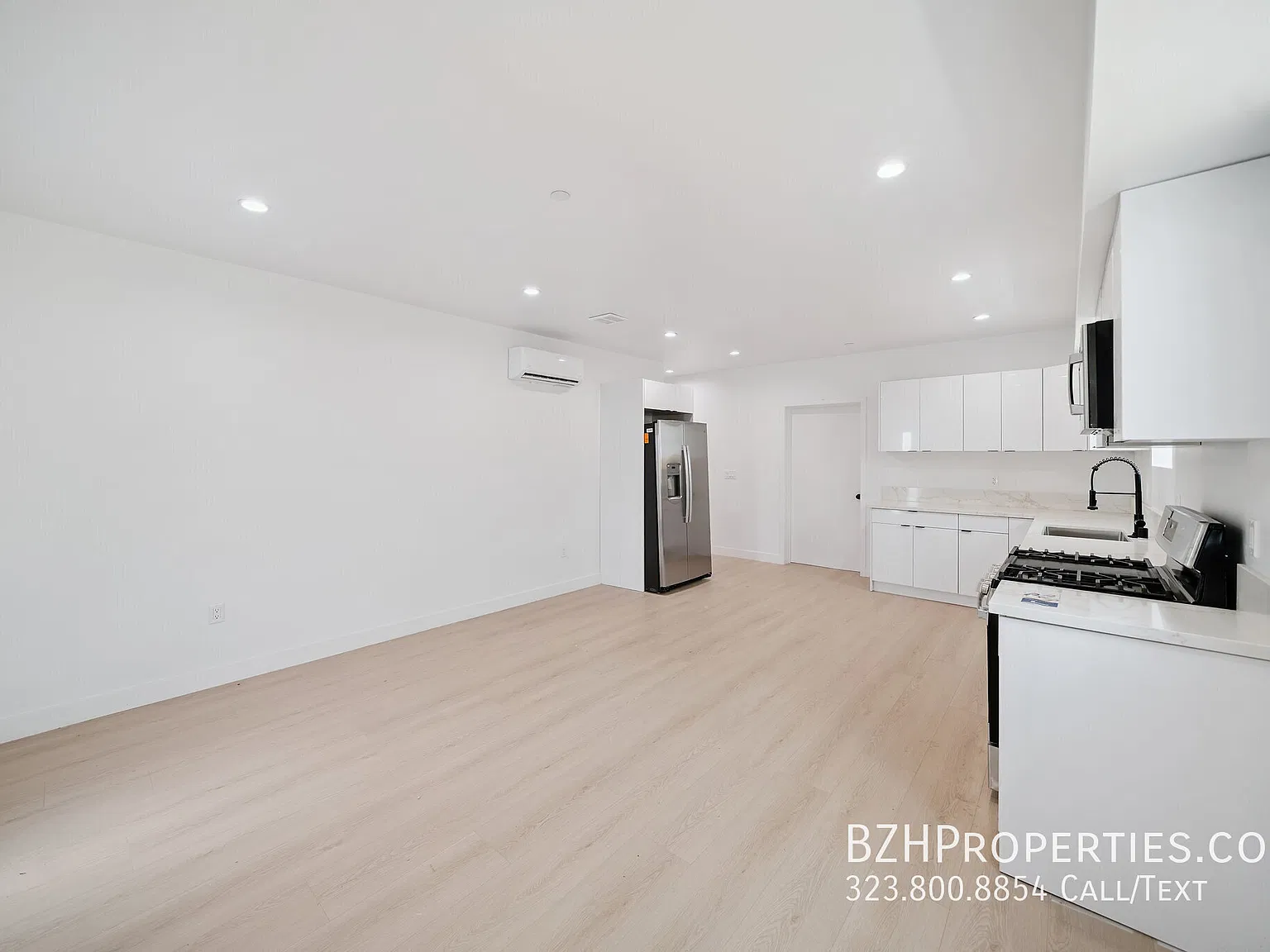 Bright 3BR with Designer Finishes & In-Unit Laundry — Photo 2