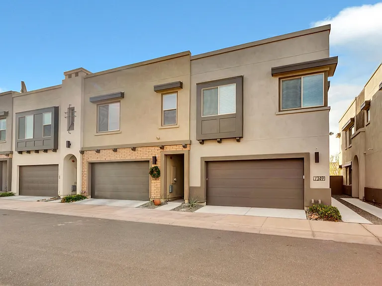 Front of house showing private entrance on the side.