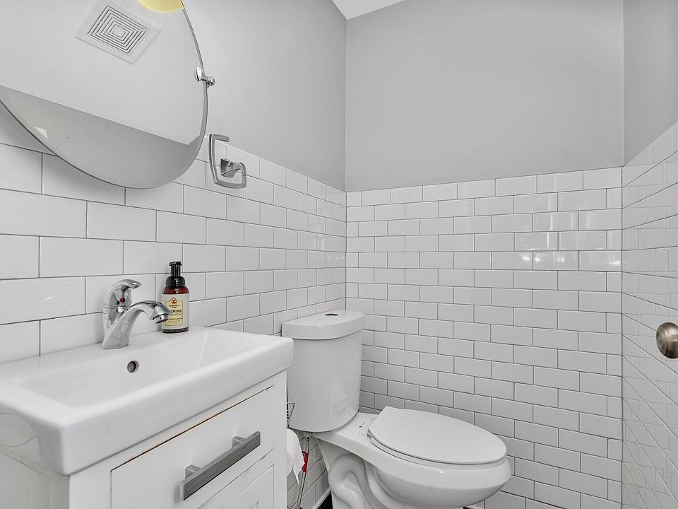 Downstairs half bath, off kitchen