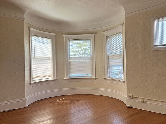 The beautiful bay windows in the first bedroom.