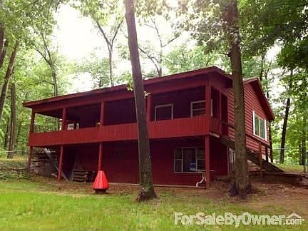 Back with walk out basement, large upper and lower decks