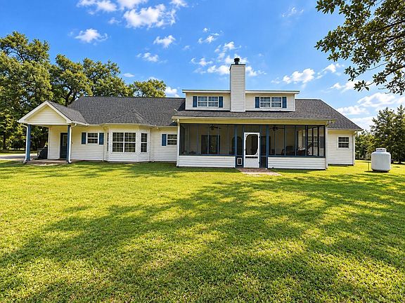 Back of house with screened 