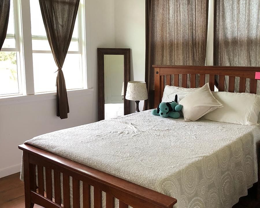 Second bedroom with large closet and built in cabinets above