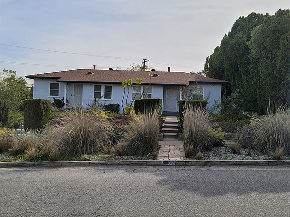 Duplex; two apartments, side by side, a corner lot: 3100 Norwich is on the left.