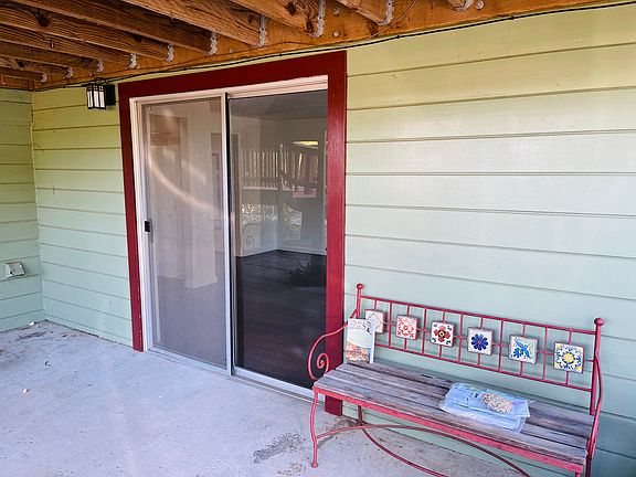 Sliding glass door entry to bedroom.