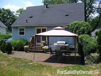 Private Fenced BackYard with brick patio