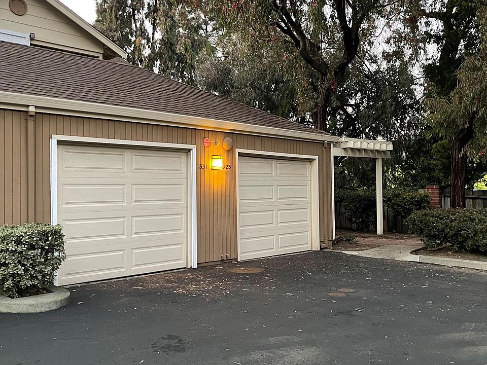 One car garage. Walkway to unit is very private and shared with only one neighbor.