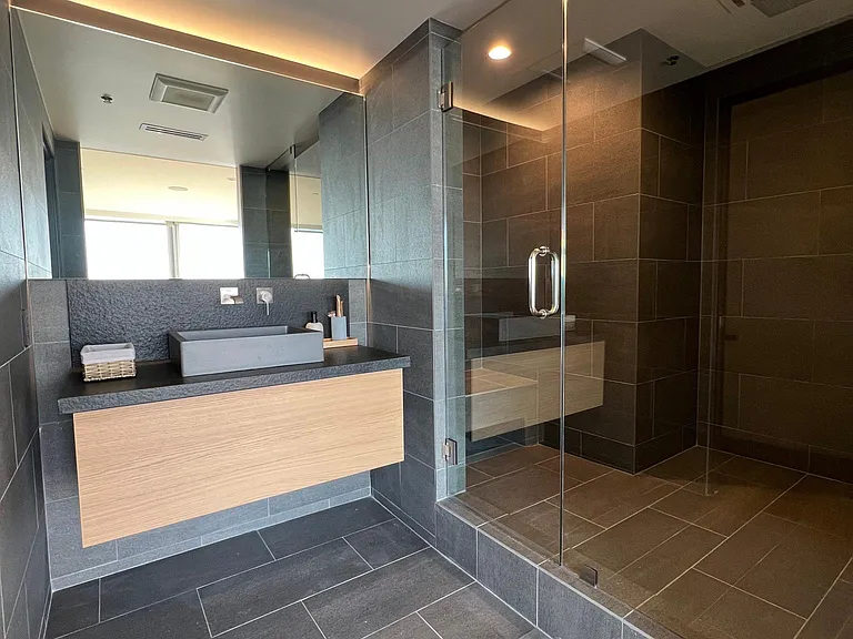 Luxurious Stone Shower with Rainfall Head & Canyon Views in Junior Suite