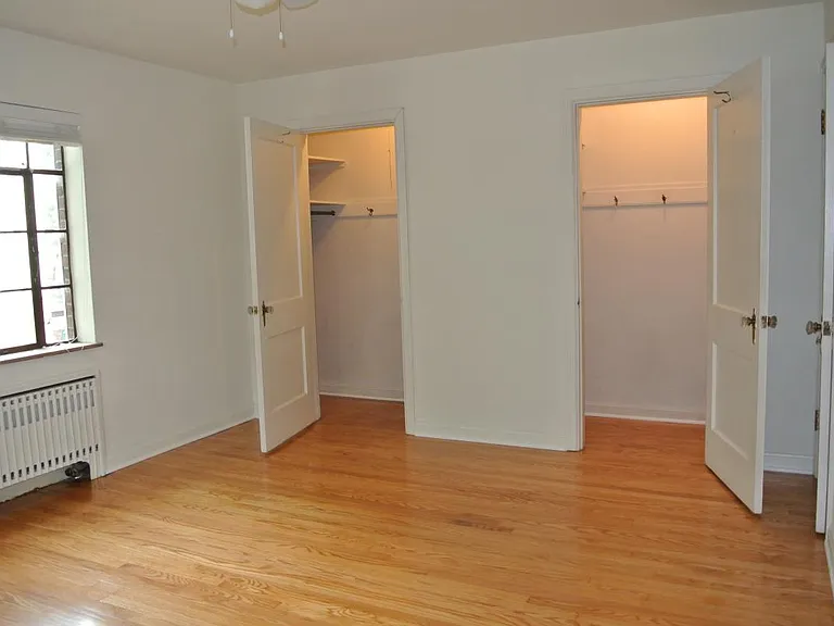 bedroom #1 with 2 walk in closets