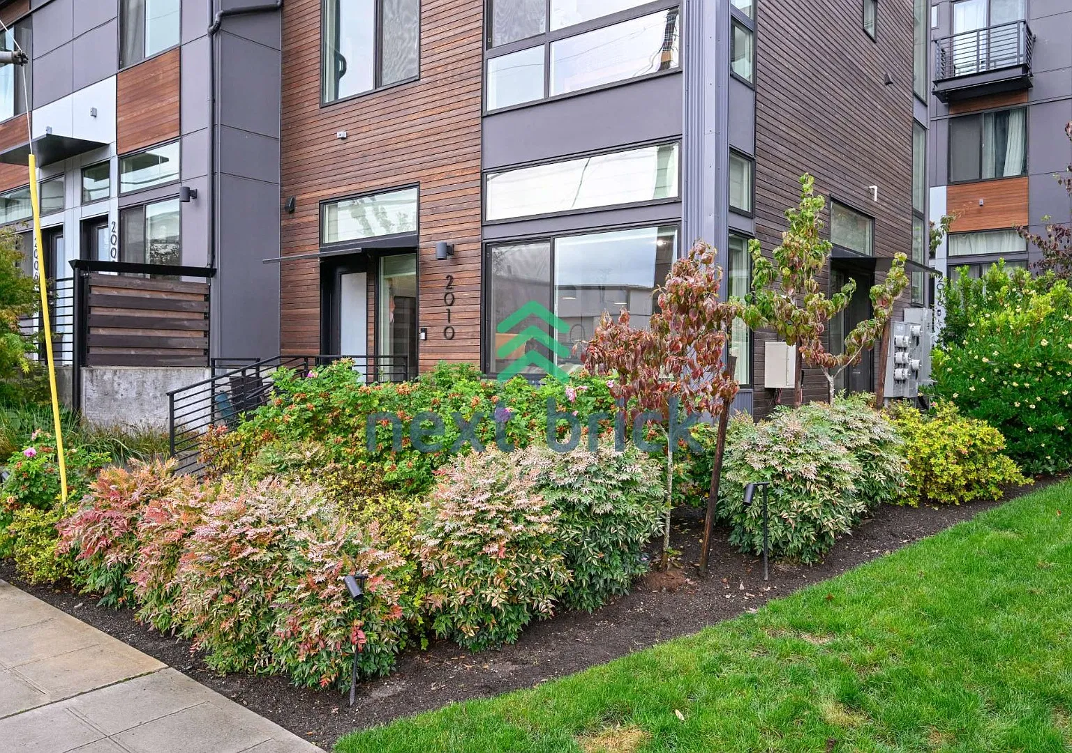 "Modern 3-Bedroom End-Unit Townhome with Spacious Deck, Quartz Kitchen & Convenient Transit Access" — Photo 2