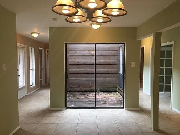 view of atrium and entryway from dining room