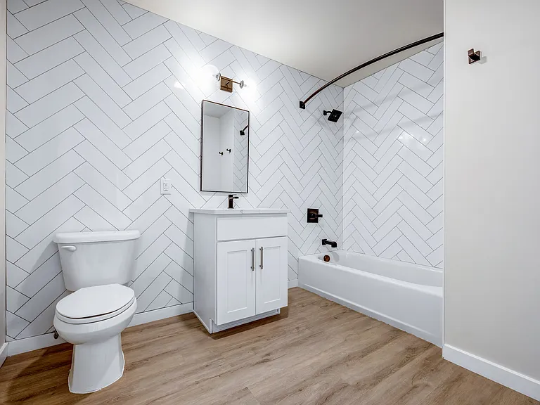 Transform your daily routine in the stylish bathrooms at Luckey Platt, featuring modern fixtures and elegant herringbone tiles. Enjoy comfort and luxury in every detail. Schedule a tour today and see your new home!