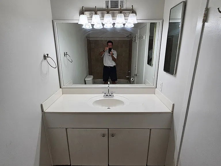 Bathroom with single vanity and plenty of counter space