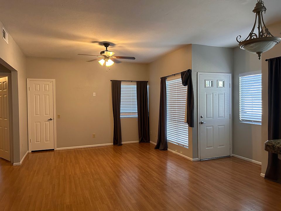 Front door into living room with closet