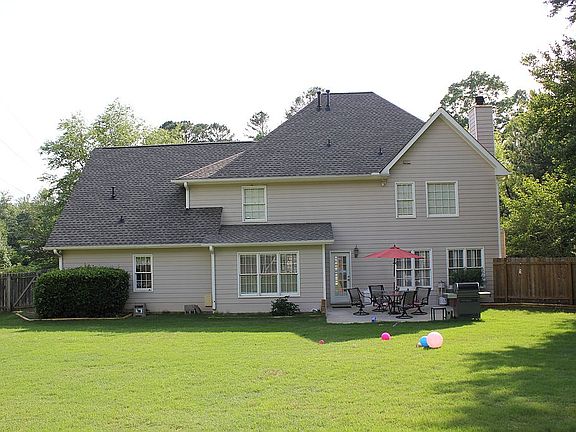 Large, flat, fenced backyard