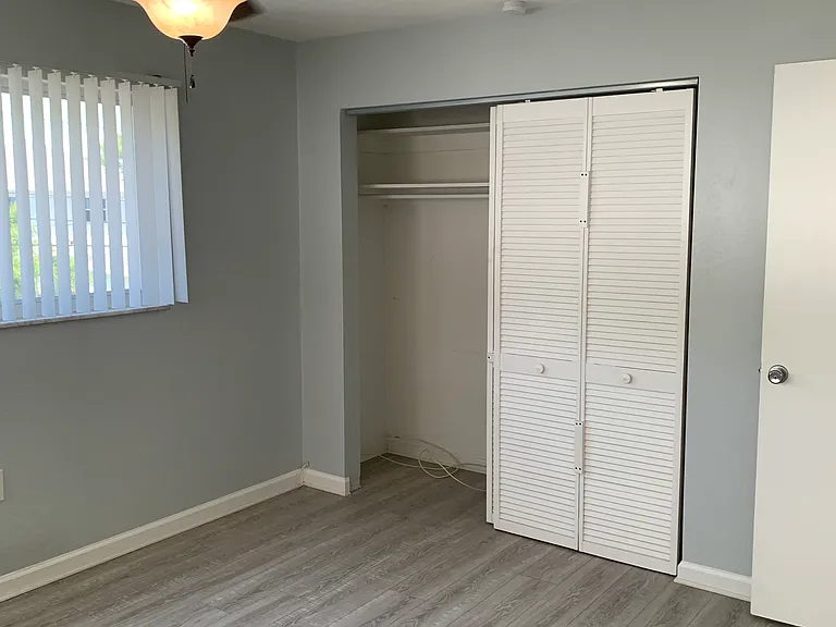 Bedroom 2 closet with sliding doors