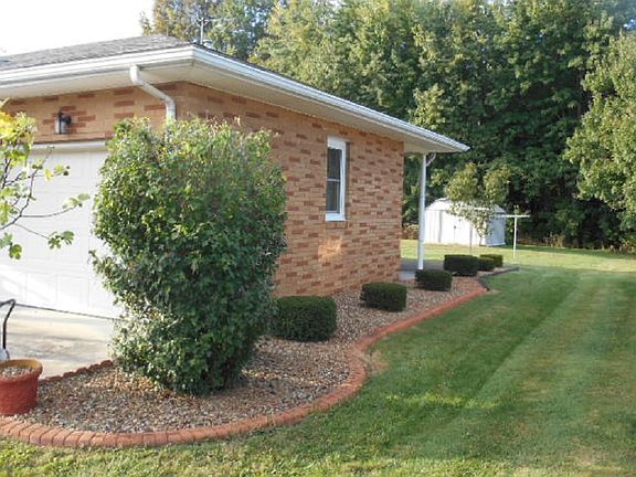 Right Side Of Home & Landsca