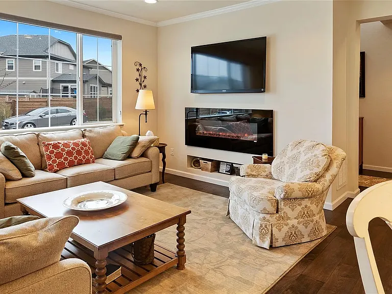 Main living area with electric fireplace
