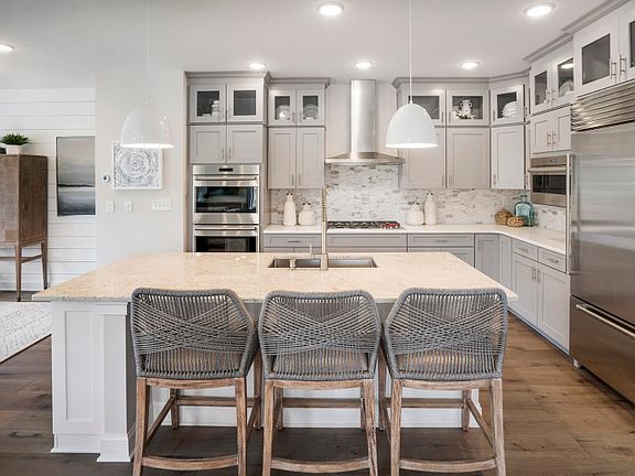 large center island providing additional seating for entertaining