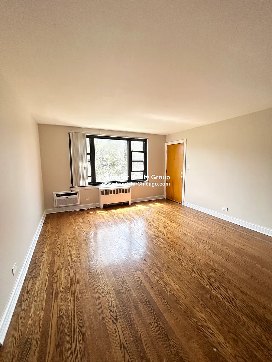 Building Photo - 7320.5 N Ridge Blvd #2E