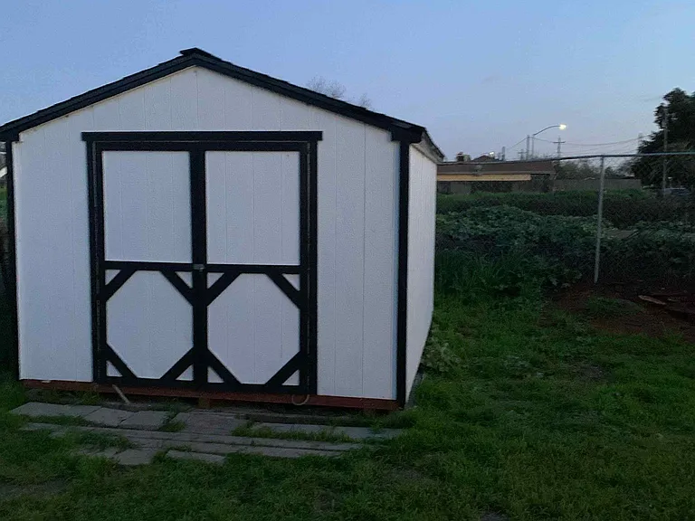 Back yard w/ storage building