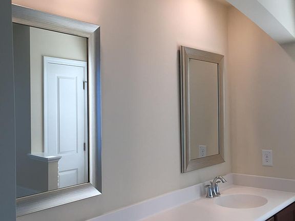 master bath with dual sinks