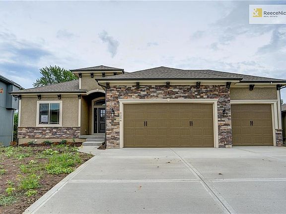 Carriage style insulated steel garage doors. Dent-resistant fiberglass front door system, electronic keypad at front door deadbolt. Architectural composite 30-year roofing shingles. Stoney Creek amenities include: 3 swimming pools, 2 playground areas, and a Sand Volleyball court.
