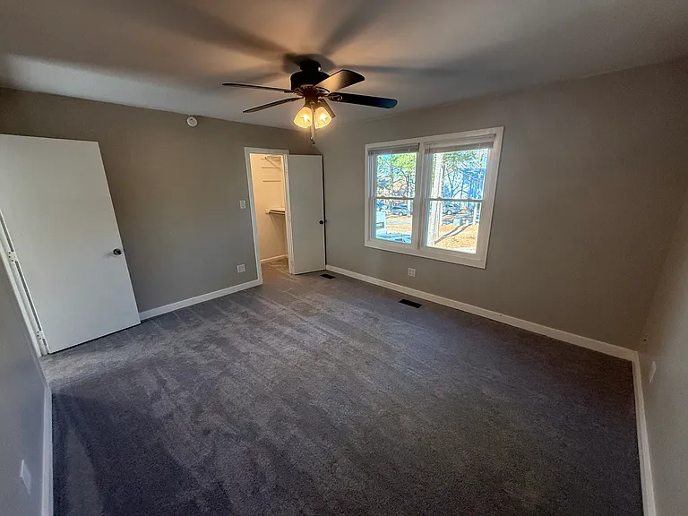 Front bedroom full to walk-in closet and front window