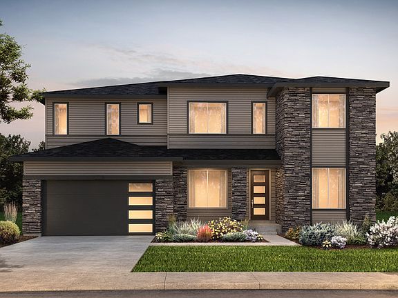 Two-story Prodigy plan shown in Elevation B with a three-car garage and a modern design.