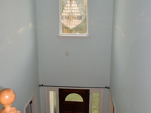 Foyer with vaulted ceiling