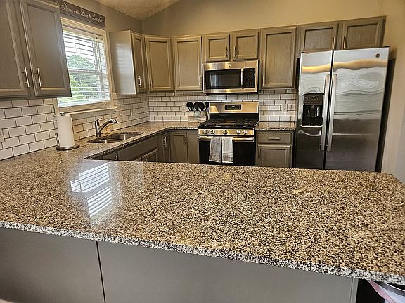 Kitchen with granite counter